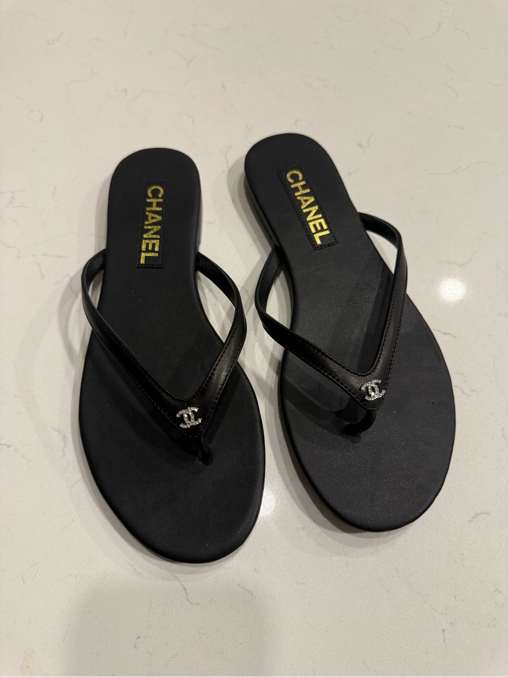 CHANEL Black Logo Thong Sandals with Silver CC Accent